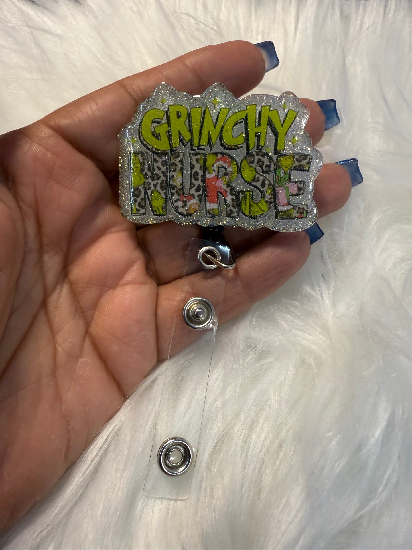 Auction 46 - Grinchy Nurse Badge Reel